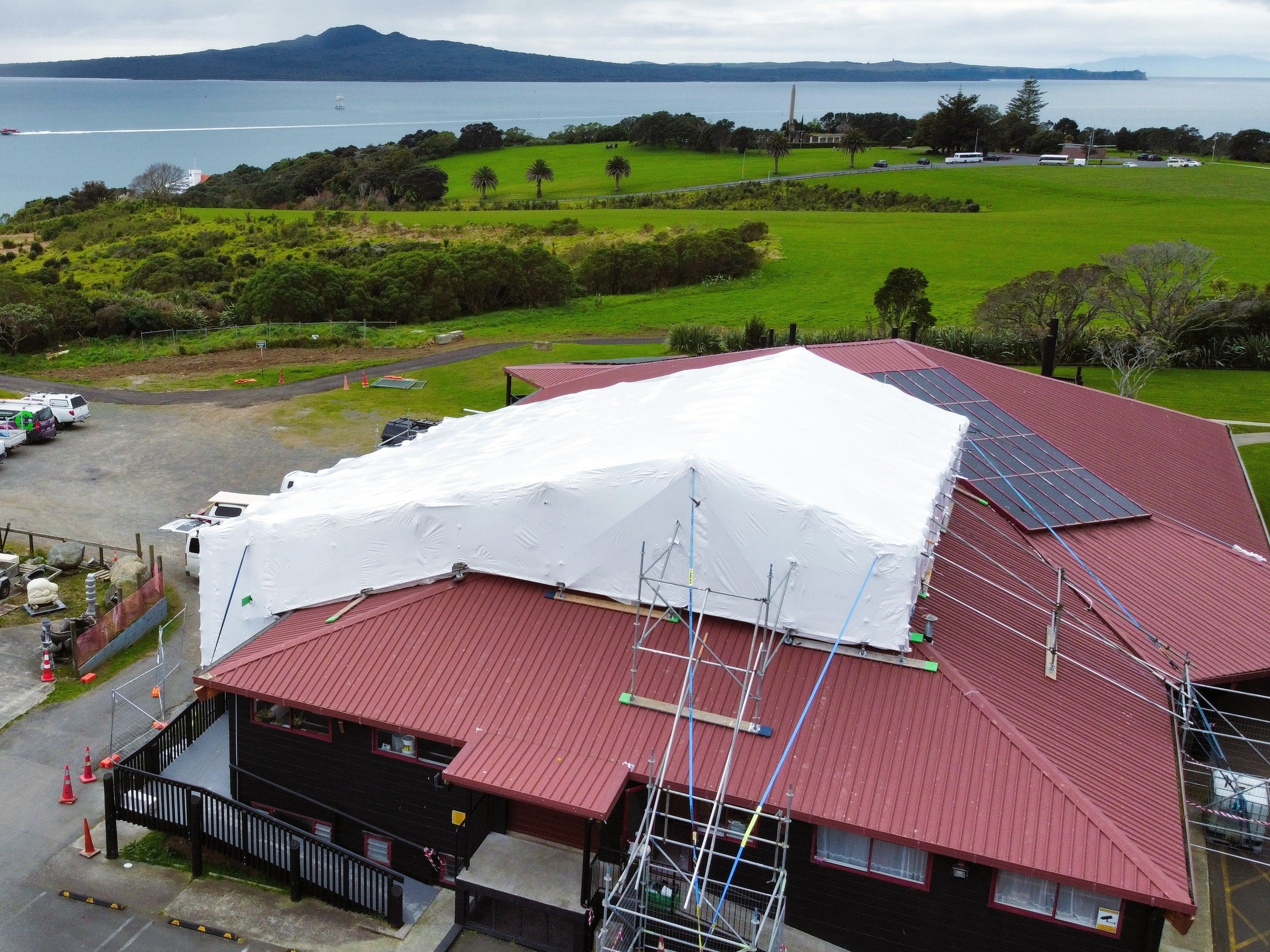 Orakei Marae Project: Scaffolding & Shrink Wrap Success with Space King Construction 🚀🏗️